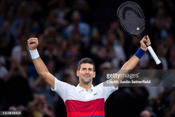 Novak Djokovic of Serbia celebrates after winning the mens singles final against Daniil Medvedev of Russia on day seven of the Rolex Paris Masters at...
