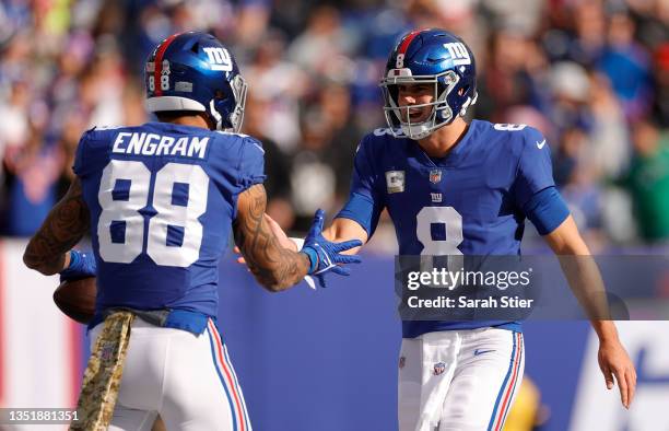 Evan Engram and Daniel Jones of the New York Giants celebrates after a touchdown during the first quarter in the game against the Las Vegas Raiders...