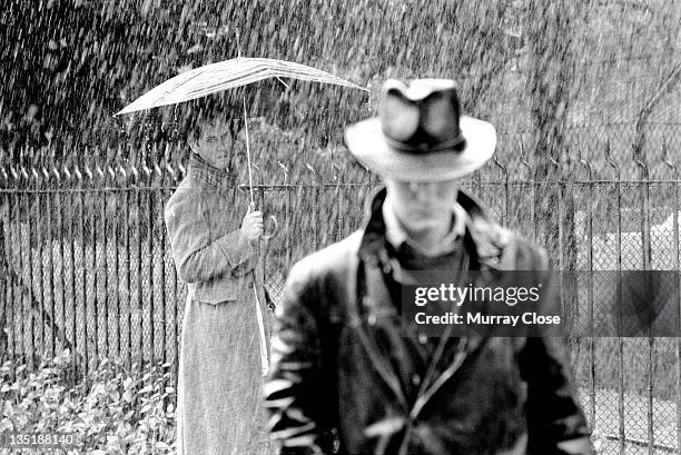 British actors Richard E. Grant and Paul McGann film the parting scene for the movie 'Withnail & I' in Regent's Park, London, 1986.