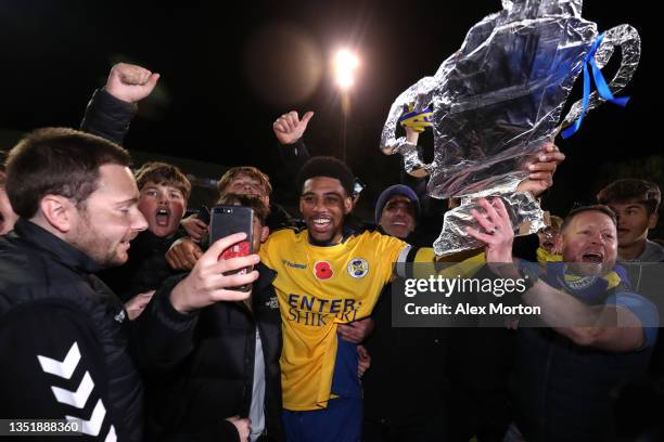 Shaun Jeffers of St Albans City celebrates with the fans on the pitch after victory in the Emirates FA Cup First Round match between St Albans City...