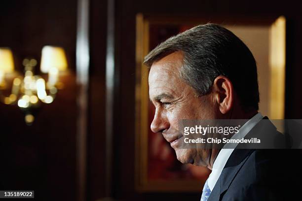 Speaker of the House John Boehner leaves after holding a news conference at the Republican National Committee offices on Capitol Hill December 7,...