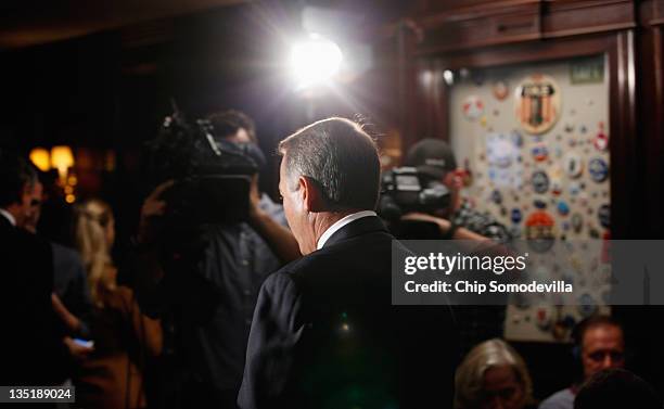 Speaker of the House John Boehner leaves after holding a news conference at the Republican National Committee offices on Capitol Hill December 7,...