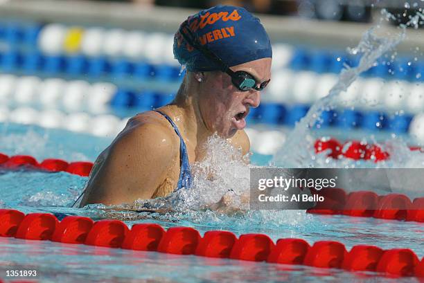 Kristen Caverly competes in the 400m individual medley during a preliminary heat of the Phillips 66 National Swimming Championships at the Hall of...