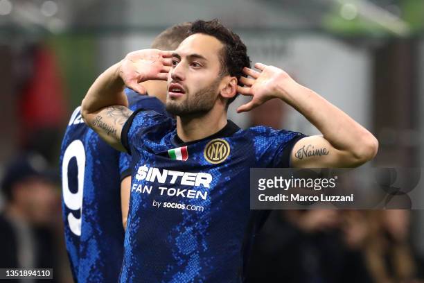 Hakan Calhanoglu of FC Internazionale celebrates after scoring their team's first goal during the Serie A match between AC Milan and FC...