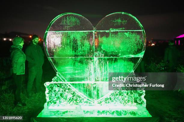 Heart-shaped ice sculpture by artist Envy is unveiled at the Govan Dry Dock which overlooks the COP26 UN Climate Change Conference on November 07,...