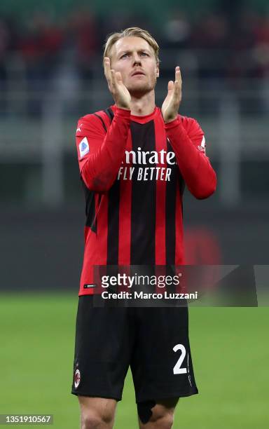 Simon Kjaer of AC Milan acknowledges the fans following the Serie A match between AC Milan and FC Internazionale at Stadio Giuseppe Meazza on...