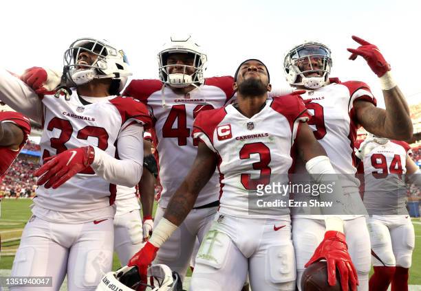 Budda Baker of the Arizona Cardinals celebrates with teammates after making an interception during the fourth quarter against the San Francisco 49ers...