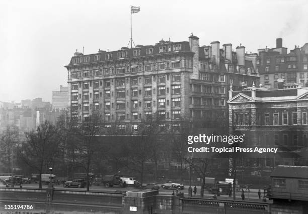 The Savoy Hotel, and traffic on Victoria Embankment, seen from Waterloo Bridge, London, 7th May 1931.