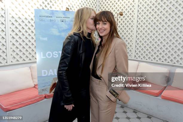 Melanie Griffith and Dakota Johnson attend Netflix's The Lost Daughter Women's Luncheon and Screening at San Vicente Bungalows on November 07, 2021...
