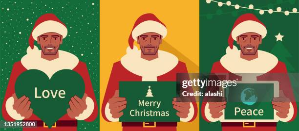 Happy Handsome Mature Men Dressed In A Santa Claus Suit Holding A Christmas Greeting Card And Heart Shape Sign And Digital Tablet High-Res Vector Graphic