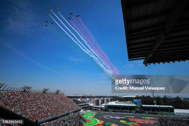 Planes fly over the track during the F1 Grand Prix of Mexico at Autodromo Hermanos Rodriguez on November 07, 2021 in Mexico City, Mexico.