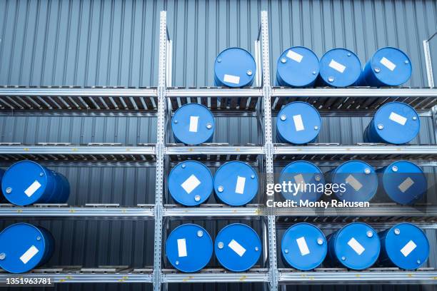 uk, manchester, barrels organized in oil blending plant - oil barrel stock pictures, royalty-free photos & images