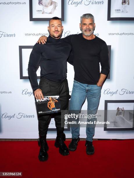 Model Oscar Yerushalmi and photographer Mike Ruiz attend the Stand Up For Pits Hollywood fundraiser event at The Hollywood Improv on November 07,...