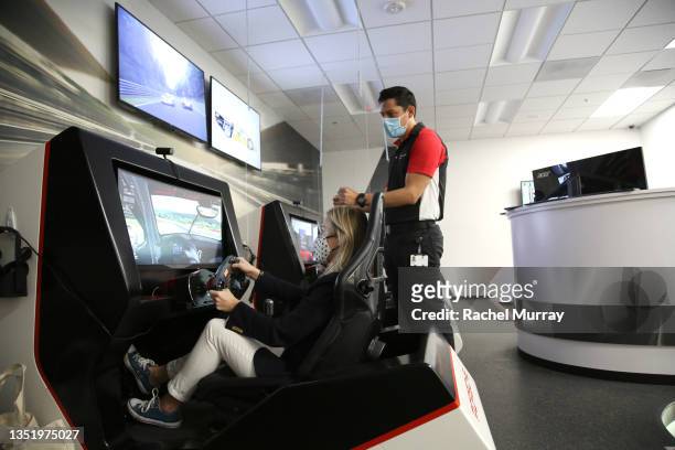 Guest drives virtually during In goop Health Summit presented by Porsche 2021 at Porsche Experience Center Los Angeles on November 07, 2021 in Los...