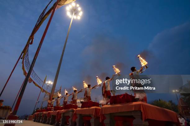 ganga arati in the morning image of holy place of india at varanasi stock photo. - aarti stock pictures, royalty-free photos & images