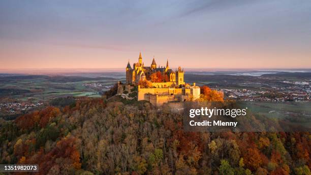 germany burg hohenzollern sunrise panorama in autumn hohenzollern castle - burg hohenzollern stockfoto's en -beelden