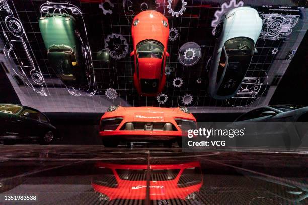 Porsche cars are on display during an exhibition marking Porsche's 20th anniversary in mainland China on November 6, 2021 in Shanghai, China.