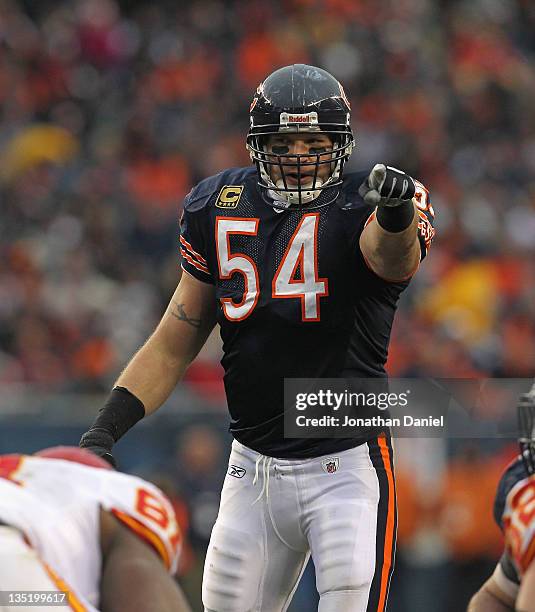 Brian Urlacher of the Chicago Bears points out an offensive alignment against the Kansas City Chiefs at Soldier Field on December 4, 2011 in Chicago,...