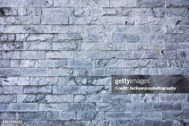 stone wall closeup background photo texture - sandstone stock pictures, royalty-free photos & images