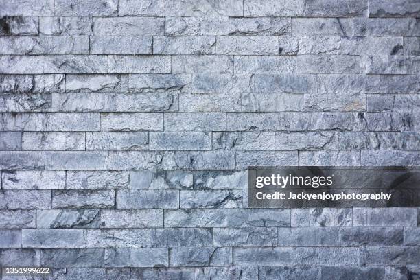 stone wall closeup background photo texture - castle wall stock pictures, royalty-free photos & images