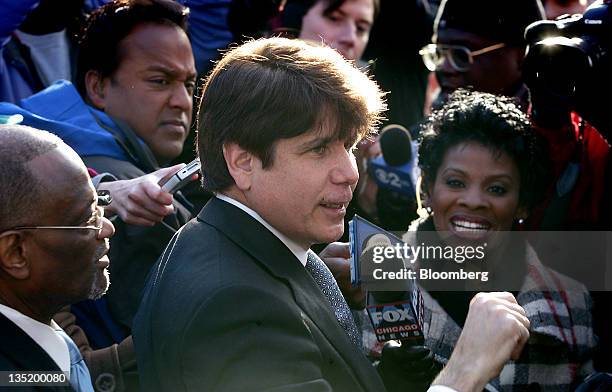 Rod Blagojevich, former governor of Illinois, speaks to the media while arriving home after sentencing in Chicago, Illinois, U.S., on Wednesday, Dec....