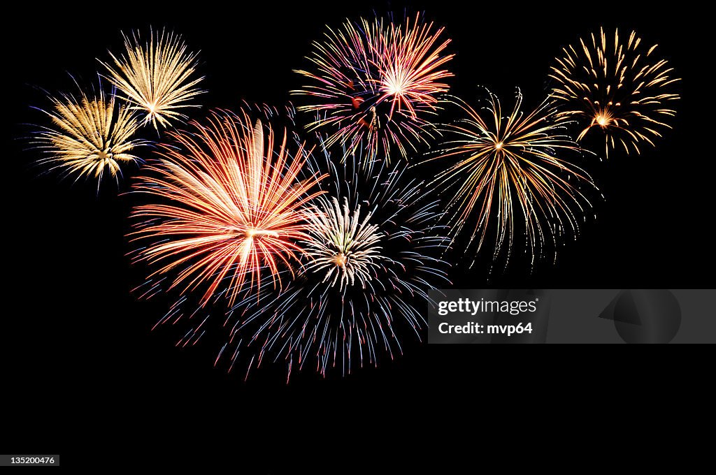 A fireworks display against the night sky