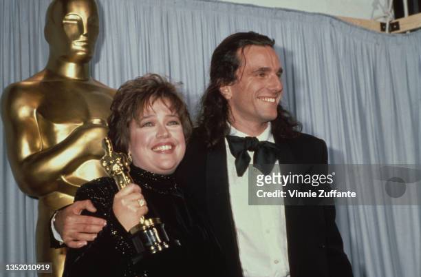 American actress Kathy Bates and British actor Daniel Day-Lewis in the press room of the 63rd Academy Awards, held at the Shrine Auditorium in Los...