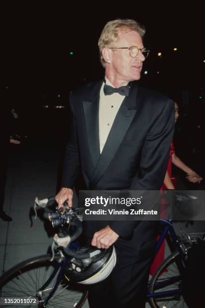 American actor Ed Begley Jr arrives on bicycle to attend the 3rd Annual Vanity Fair Oscar Party, held at Morton's Restaurant in West Hollywood,...