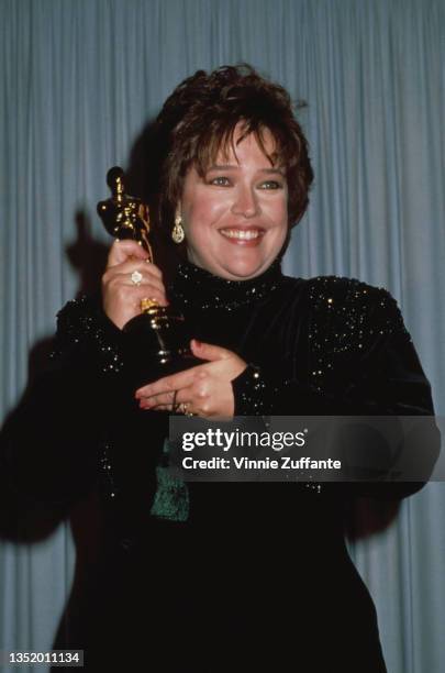 American actress Kathy Bates in the press room of the 63rd Academy Awards, held at the Shrine Auditorium in Los Angeles, California, 25th March 1991....