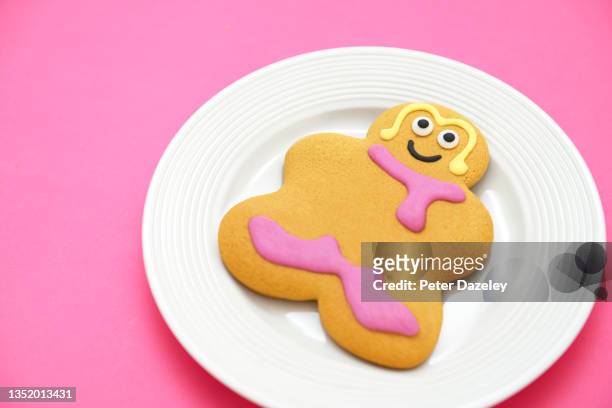 fat gingerbread woman - childhood obesity stock pictures, royalty-free photos & images