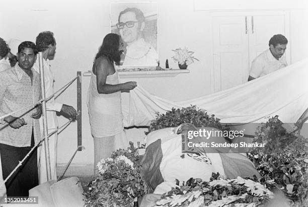 Swami Dhirendra Brahmachari, yoga guru in Gandhi household prepares Sanjay Gandhi's body for funeral in New Delhi on June 25, 1980.