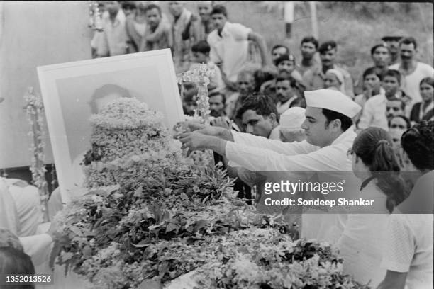 Rajiv Gandhi accompany the urn containing mortal remains of Sanjay Gandhi being carried in a procession for for immersion at Sangam, the confluence...