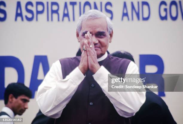 Prime Minister Atal Behari Vajpayee greets participants at a conference in New Delhi on March 18, 1998.