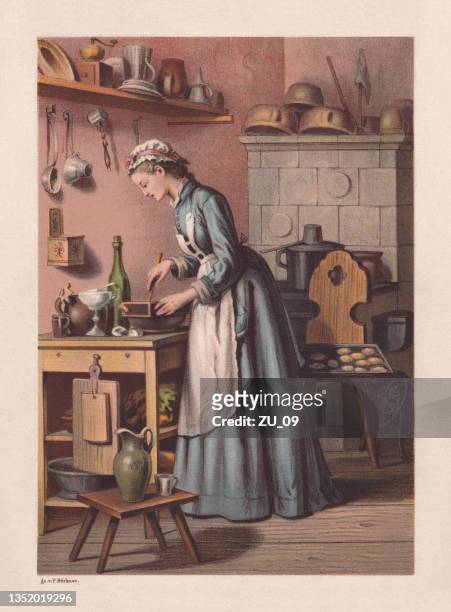 young woman in the kitchen preparing food, chromolithograph, published 1878 - making a cake stock illustrations