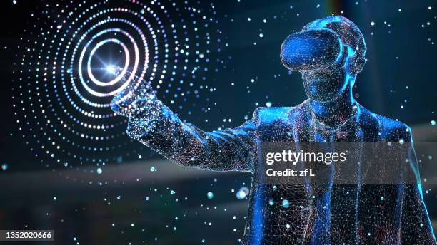 the man playing vr goggle with colorful lighting - vr goggles business stockfoto's en -beelden