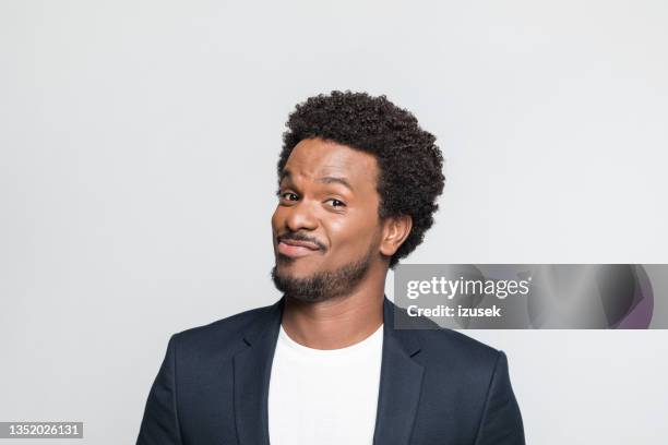 headshot of cheerful young businessman - funny black people faces stock pictures, royalty-free photos & images