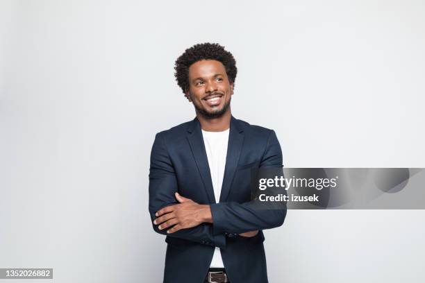 portrait of cheerful young businessman - man in black suit stock pictures, royalty-free photos & images