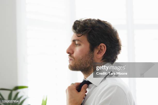 profile portrait of young man. - beards jewellery london stock-fotos und bilder