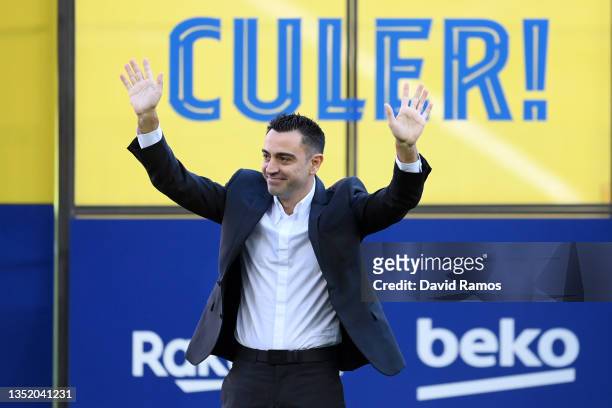 New FC Barcelona Head Coach Xavi Hernandez acknowledges fans during a press conference at Camp Nou on November 08, 2021 in Barcelona, Spain.