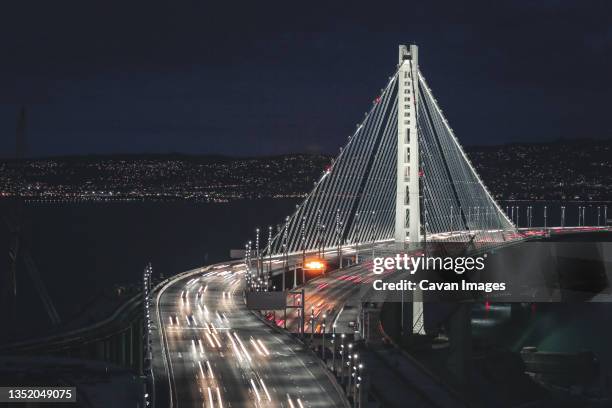 view of the bay bridge from treasure island - treasure island california stock pictures, royalty-free photos & images