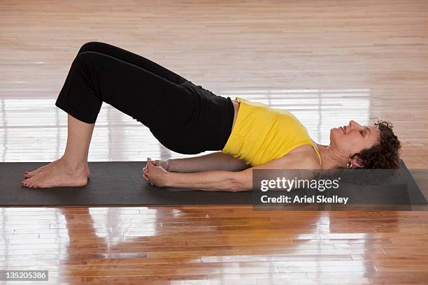 Hi Rise Supine Supine Yoga Poses Photos and Premium High Res Pictures - Getty Images