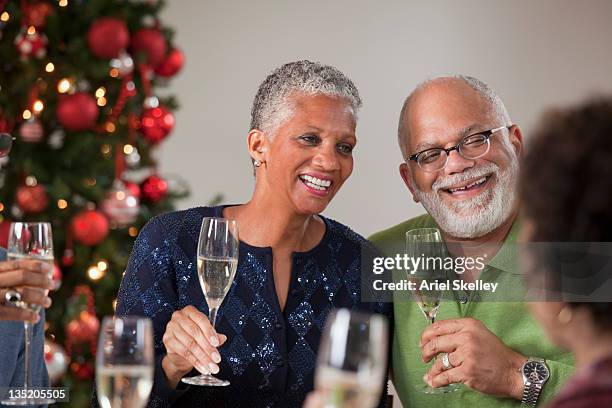 friends toasting at christmas dinner party - christmas background no people stock pictures, royalty-free photos & images