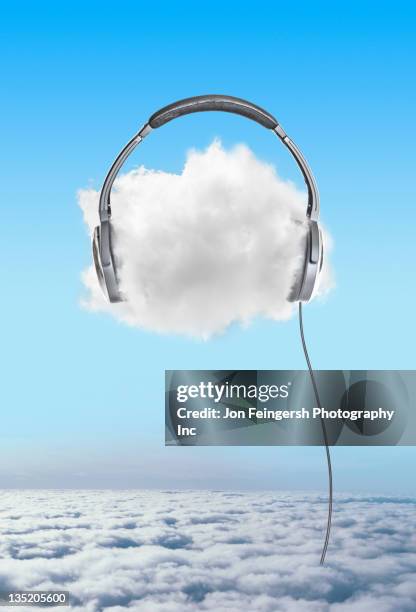 large headphones on cloud in sky - music preservation project stock pictures, royalty-free photos & images