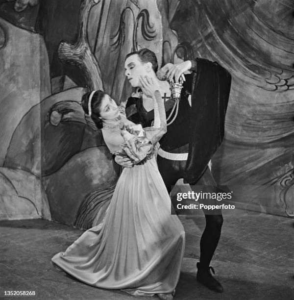 English ballerina Margot Fonteyn and Australian ballet dancer Robert Helpmann play the roles of Ophelia and Hamlet during rehearsals for a Sadler's...