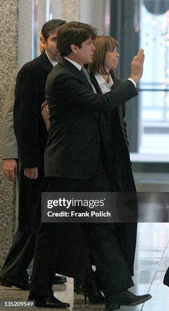 Former Illinois Governor Rod Blagojevich pauses while speaking to the media with his wife Patti Blagojevich at the Dirksen Federal Building December...