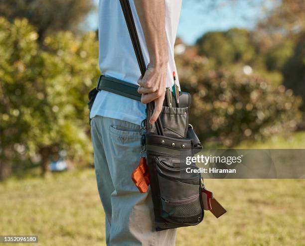 shot of a male archer setting up his equipment - quiver stock pictures, royalty-free photos & images