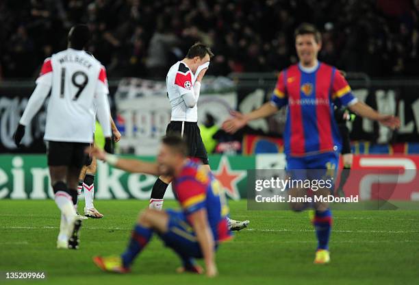 Phil Jones of Manchester United walks dejected after losing 2-1 in the UEFA Champions League Group C match between FC Basel 1893 and Manchester...