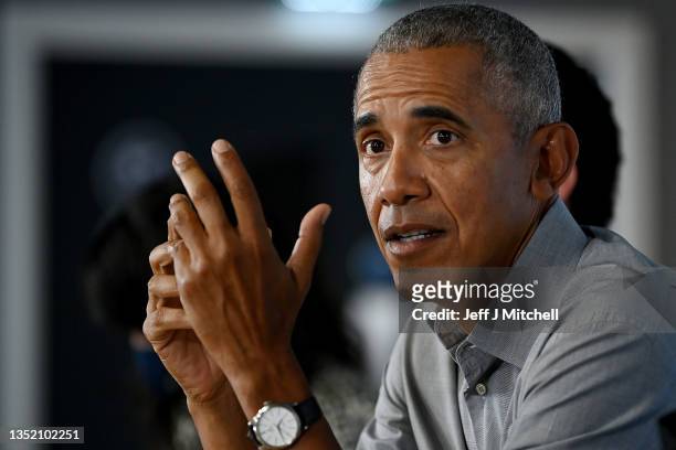 Former US President Barack Obama gestures as he speaks during a round table meeting at the University of Strathclyde on November 08, 2021 in Glasgow,...