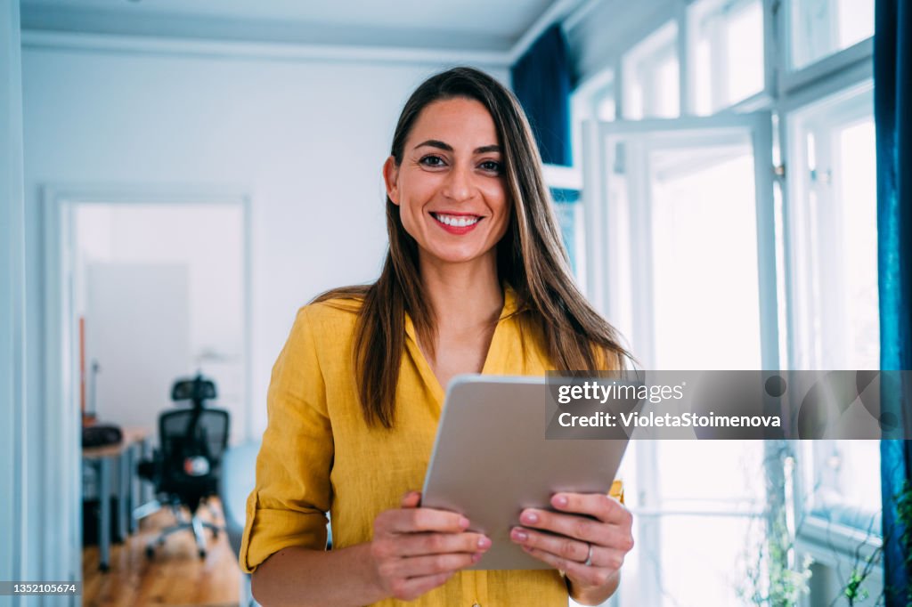 Confident businesswoman in modern office.