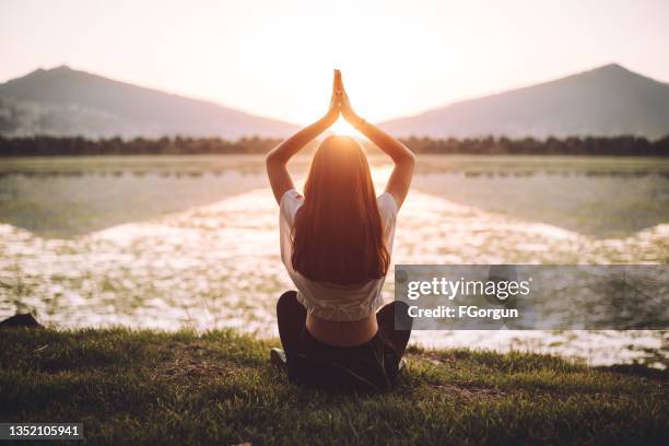 young woman yoga - chakras stock pictures, royalty-free photos & images